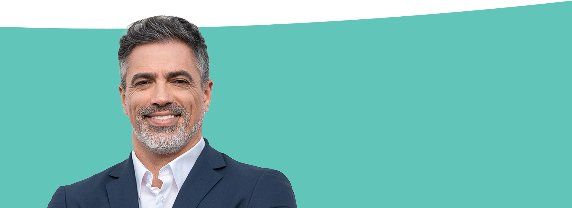 The image features a man with gray hair, wearing a suit, standing against a blue background with a white border on the left side.